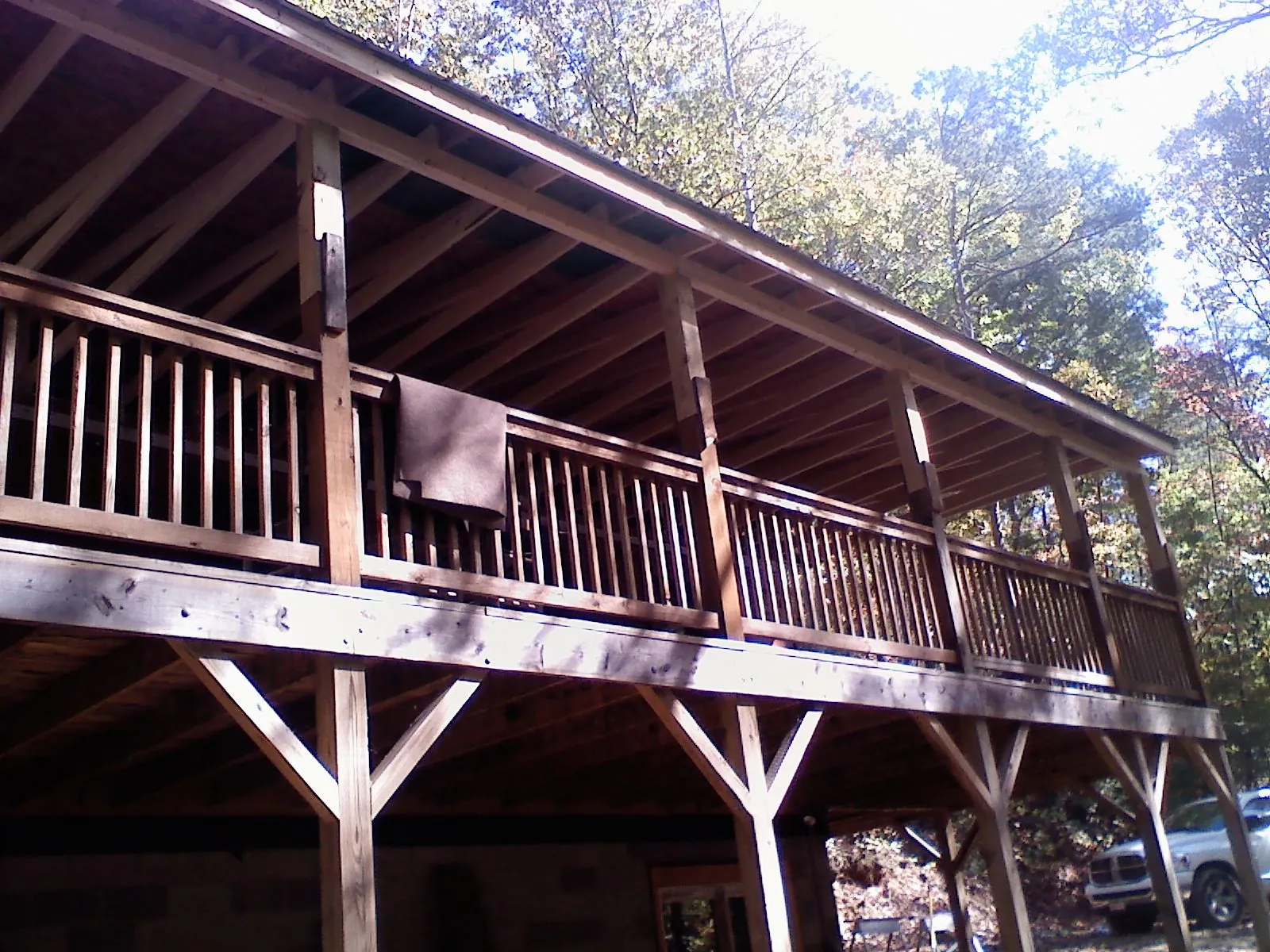 Timber framing under a new elevated porch and deck — Roof Leak Repair in Foss by Roofing Brothers